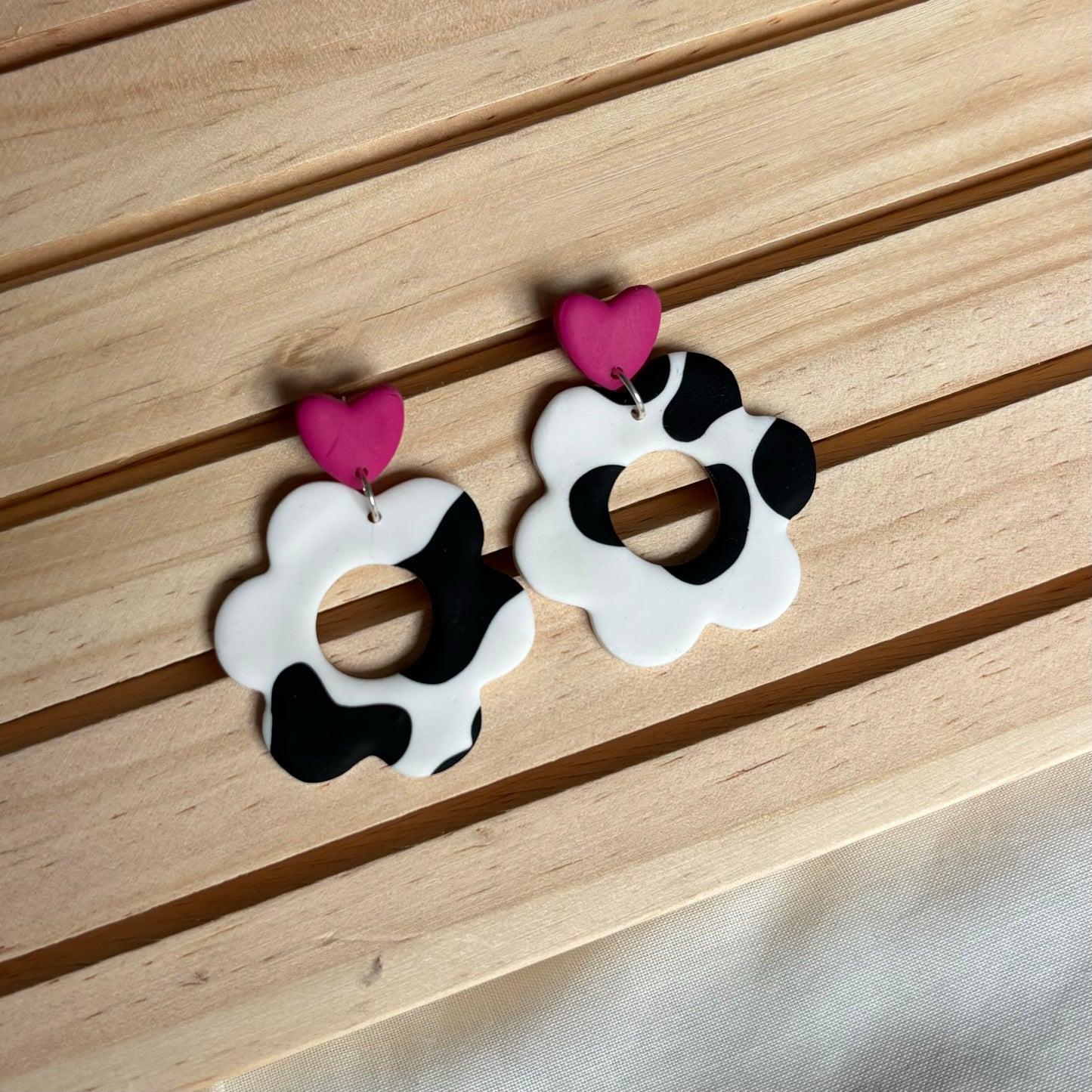 Cow print floral clay earrings